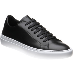 Fashionable black trainers 2025
